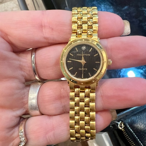 Halston Gold & Black vintage style watch w/ solitary diamond & 7” band.
